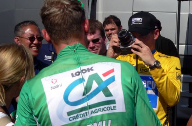 Armstrong shoots Thor Hushovd and Sheryl Crow after Hushovd signed a green jersey for Sheryl. "To you from a true champion." Photo copyright Tommy Murphy/Roadcycling.com.