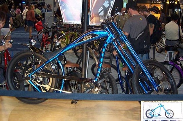 Nirve's beautiful blue custom chopper. Photo copyright Roadcycling.com.