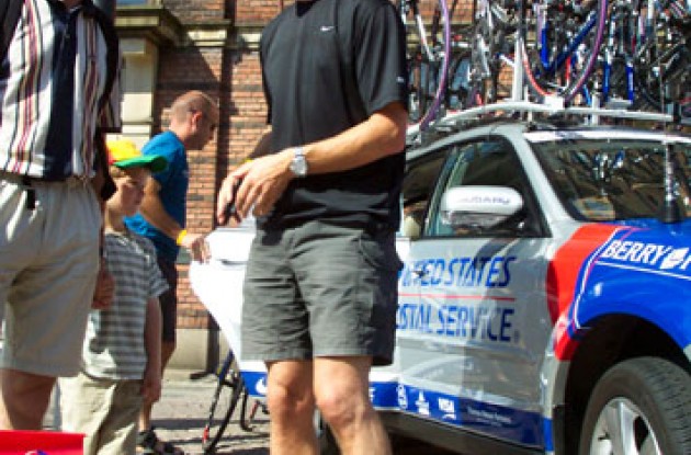 USPS team director Dirk Demol has a chat with a friend shortly before the start in Odense. Photo copyright Roadcycling.com.