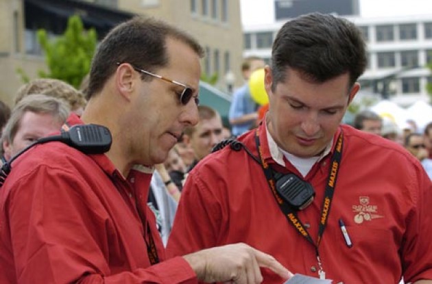Race Director Jim Burrell confers with Technical Director Chuck Hodge about today's course. Photo copyright Casey Gibson.