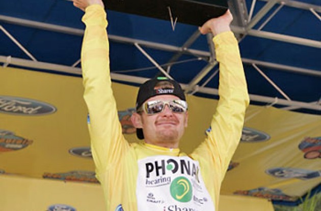 A proud Floyd Landis with his TdG trophy. Photo copyright Ben Ross/Roadcycling.com/<A HREF="http://www.benrossphotography.com" TARGET=_BLANK>www.benrossphotography.com</A>.