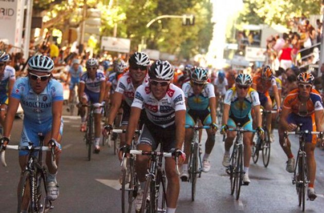 Sastre, Contador and Leipheimer cross the finish line.
