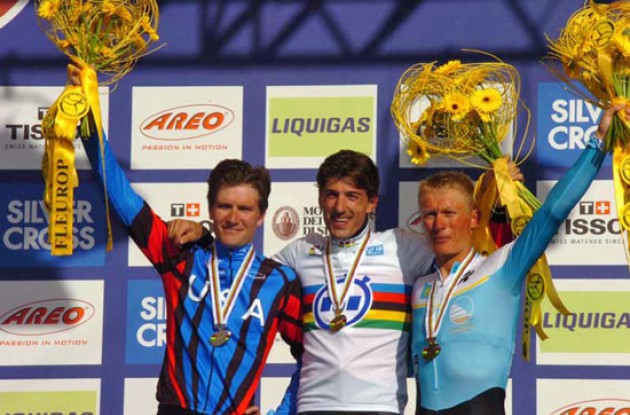 Top 3 on the podium in Salzburg, Austria: Cancellara, Zabriskie and Vinokourov. Photo copyright Fotoreporter Sirotti.