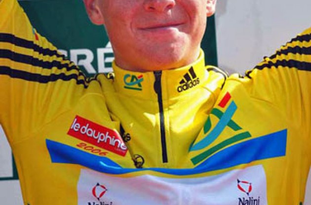 Fabian Wegmann wearing yellow on the podium. Photo copyright Fotoreporter Sirotti.