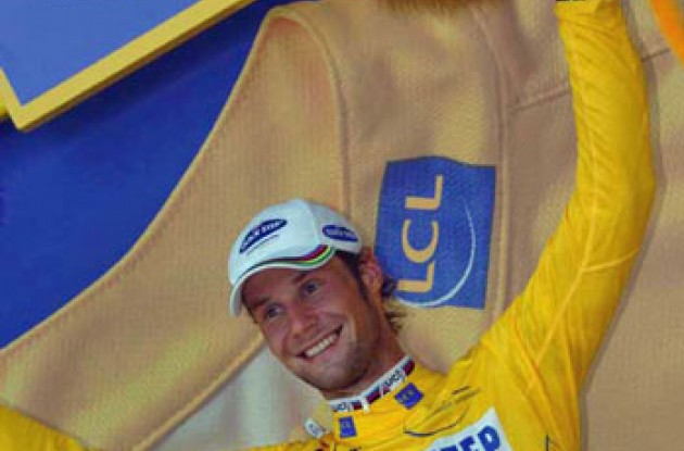 Tom Boonen is now the man in yellow. Photo copyright Fotoreporter Sirotti. Tom Boonen is now the man in yellow. Photo copyright Fotoreporter Sirotti.