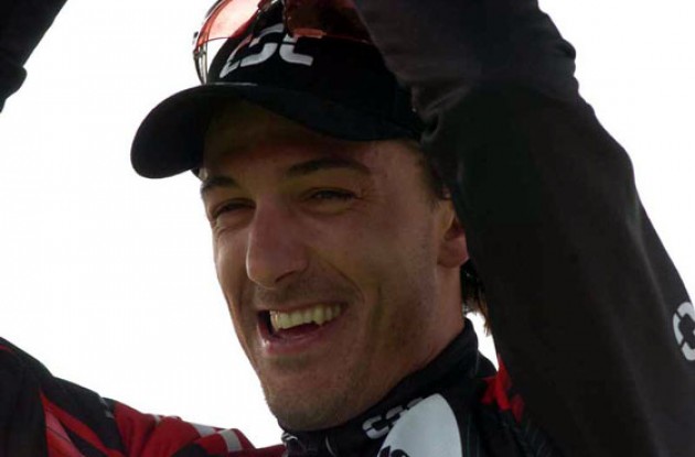 I did it! Cancellara on the podium in Roubaix after a hard day in the saddle. Photo copyright Fotoreporter Sirotti.