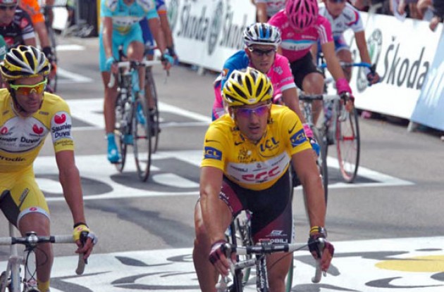Cancellara crosses the line in safe condition. Cancellara crosses the line in safe condition.