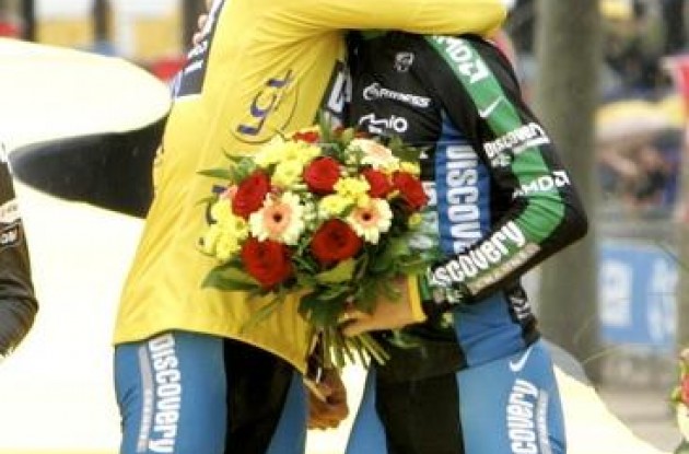 We did it! Thanks mate! Contador hugs Leipheimer in Paris. Photo copyright <A HREF="http://www.photoshelter.com/usr-show?U_ID=U0000yEwV90OAoAE" TARGET="_BLANK">www.BenRossPhotography.com</A>.