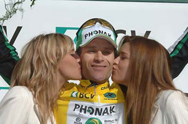 Sweet times for Santiago Botero (Phonak Hearing Systems) on the podium. Photo copyright Roadcycling.com.