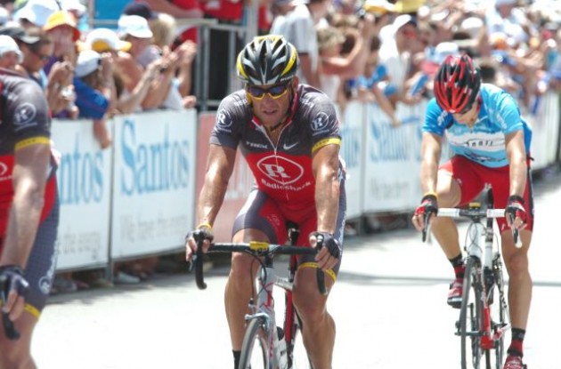 Lance Armstrong crosses the line. Photo copyright Fotoreporter Sirotti.