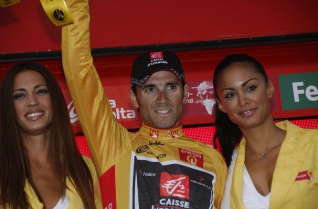 Alejandro Valverde on the podium with the beautiful Spanish podium girls. Photo copyright Fotoreporter Sirotti.