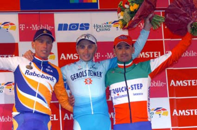 The top three on the podium. From left to right Michael Boogerd (Rabobank), Davide Rebellin (Gerolsteiner) and Paolo Bettini (Quick Step). Photo copyright Fotoreporter Sirotti. The top three on the podium. From left to right Michael Boogerd (Rabobank), Davide Rebellin (Gerolsteiner) and Paolo Bettini (Quick Step). Photo copyright Fotoreporter Sirotti.