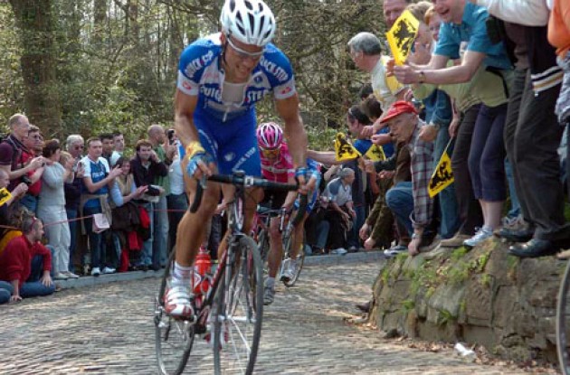Boonen fights his way up one of the many steep climbs. Photo copyright Fotoreporter Sirotti.