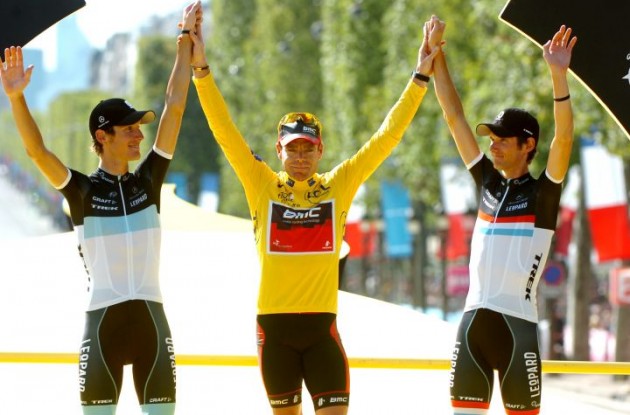 Cadel Evans, Andy Schleck and Frank Schleck on the Tour de France podium in Paris. Will they be on the final podium of the 2011 USA Pro Cycling Challenge as well? Photo Fotoreporter Sirotti.