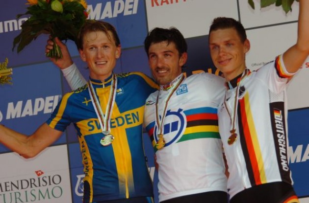 Fabian Cancellara, Gustav Erik Larsson amd Tony Martin on the podium. Photo copyright Fotoreporter Sirotti.