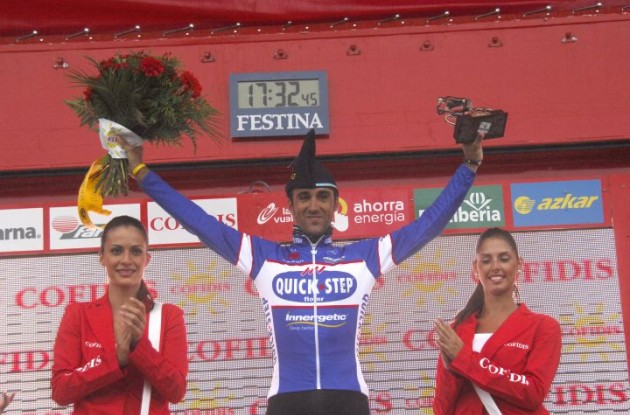 A proud and moved Carlos Barredo on the podium celebrating his Tour of Spain stage win. Photo copyright Fotoreporter Sirotti. A proud and moved Carlos Barredo on the podium celebrating his Tour of Spain stage win. Photo copyright Fotoreporter Sirotti.