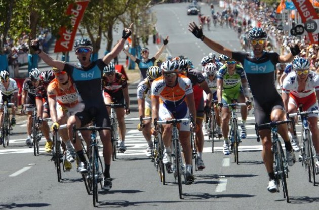 Chris Sutton wins and Team Sky teammate Greg Henderson celebrates the win. Photo copyright Fotoreporter Sirotti. Chris Sutton wins and Team Sky teammate Greg Henderson celebrates the win. Photo copyright Fotoreporter Sirotti.