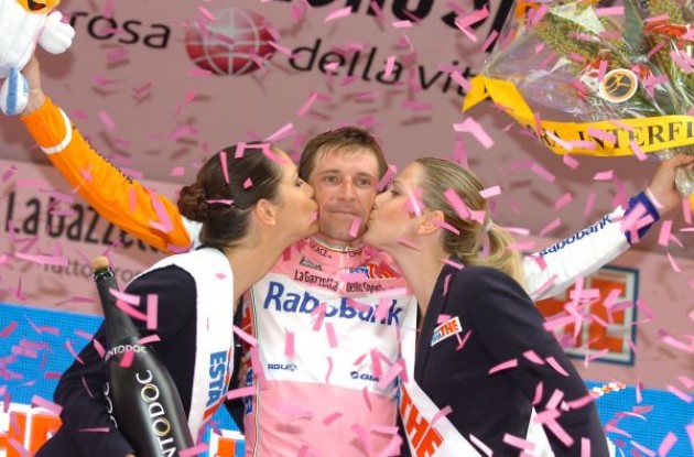 Denis Menchov (Rabobank) on the podium with the beautiful podium girls. Photo copyright Fotoreporter Sirotti.