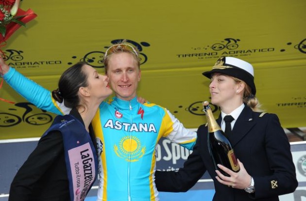 Enrico Gasparotto (Team Astana) on the podium with the cute Italian podium girls. Photo copyright Fotoreporter Sirotti.