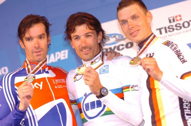World Champion Fabian Cancellara on the podium in Geelong with David Millar and Tony Martin. Photo Fotoreporter Sirotti.