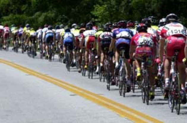 A long line of 140 riders in the mist of the 136-mile first stage. Photo copyright Michael Pugh. A long line of 140 riders in the mist of the 136-mile first stage. Photo copyright Michael Pugh.