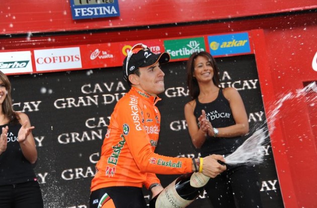 Igor Anton celebrates his powerful win on the podium. Photo copyright Fotoreporter Sirotti.