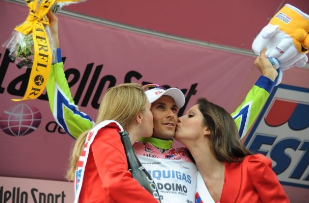 Ivan Basso enjoying some quality time on the podium. Photo copyright Fotoreporter Sirotti.