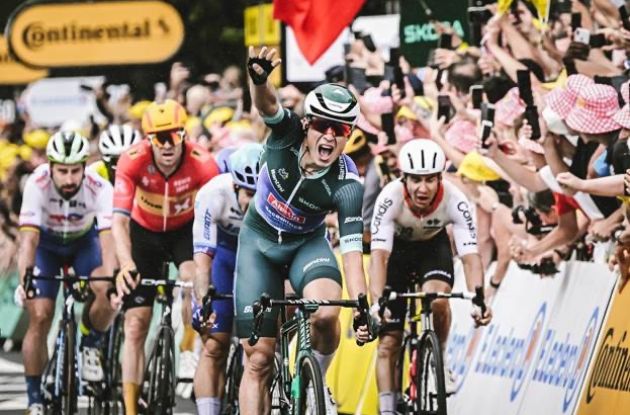 Jasper Philipsen crosses the finish line as winner of stage 11 of Tour de France 2023
