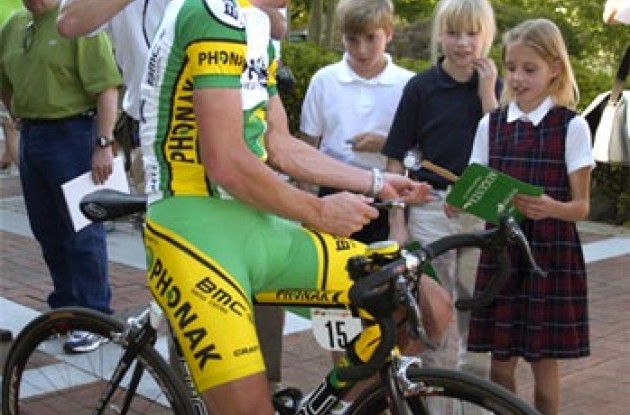 Landis signs. Fans are getting younger and younger. Photo copyright Ben Ross/Roadcycling.com. Landis signs. Fans are getting younger and younger. Photo copyright Ben Ross/Roadcycling.com.