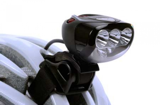 Light and Motion Seca 700 Race LED front bike light mounted on a helmet.