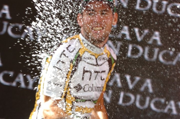 Team HTC-Columbia's Mark Cavendish celebrates his 2nd Vuelta stage win on the podium in Burgos. Photo copyright Fotoreporter Sirotti.