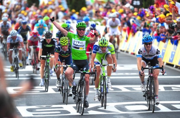 Team HTC-HighRoad's Mark Cavendish wins stage 15 of the Tour de France 2011 ahead of Tyler Farrar of Team Garmin-CervÃ©lo and Alessandro Petacchi of Team Lampre-LSD. Photo Fotoreporter Sirotti.