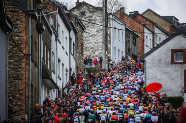 | A.S.O. Peloton climbs Cote de la Redoute in Liege-Bastogne-Liege