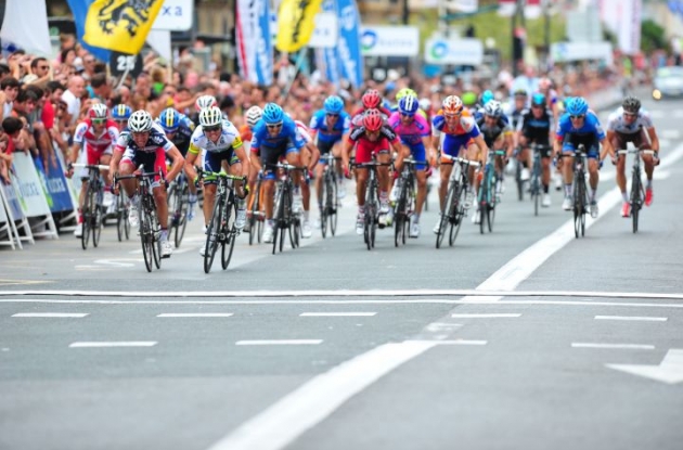 ... ahead of Team GreenEdge's Simon Gerrans and Team Lotto Belisol's Gianni Meersman. Photo Fotoreporter Sirotti.