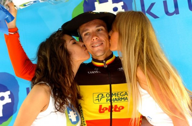 Clasica San Sebastian winner Philippe Gilbert gets som sweet attention from the podium girls. Photo Fotoreporter Sirotti.