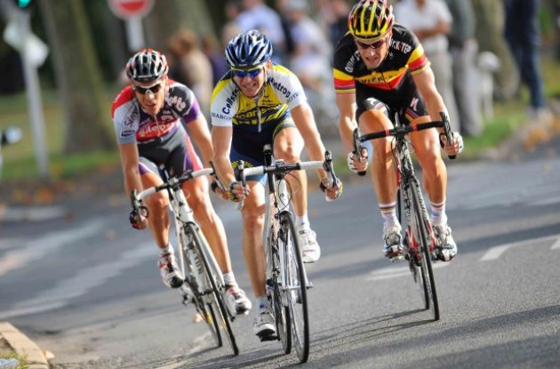 Philippe Gilbert, Borut Bozic and Tom Boonen riding hard. Photo copyright Fotoreporter Sirotti.