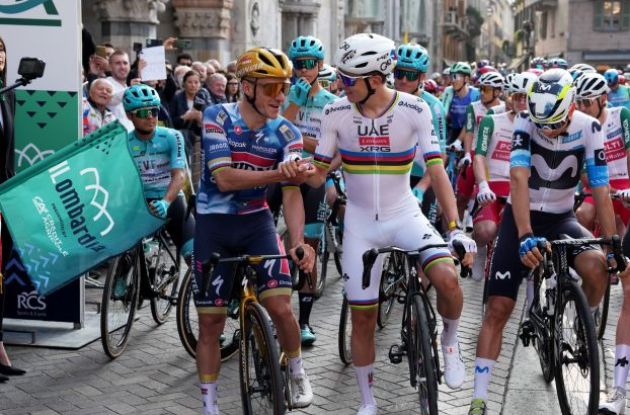Remco Evenepoel and Tadej Pogacar shake hands