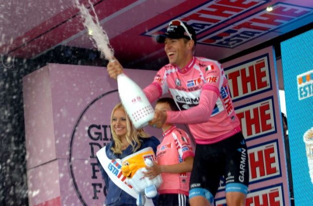 Giro d'Italia leader Ryder Hesjedal (Team Garmin-Barracuda) celebrates his lead on the podium. Photo Fotoreporter Sirotti.