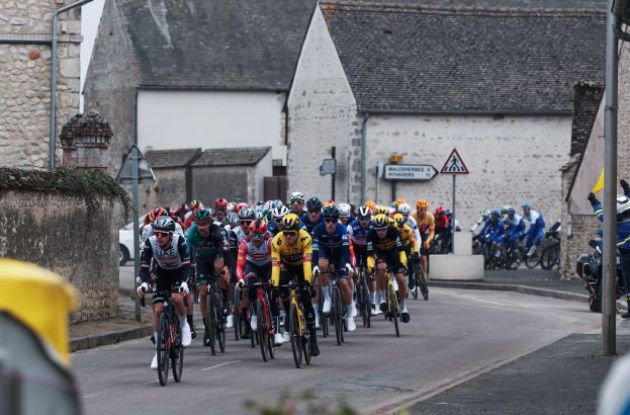 Cyclists pass through French village during stage 2 of Paris-Nice 2023