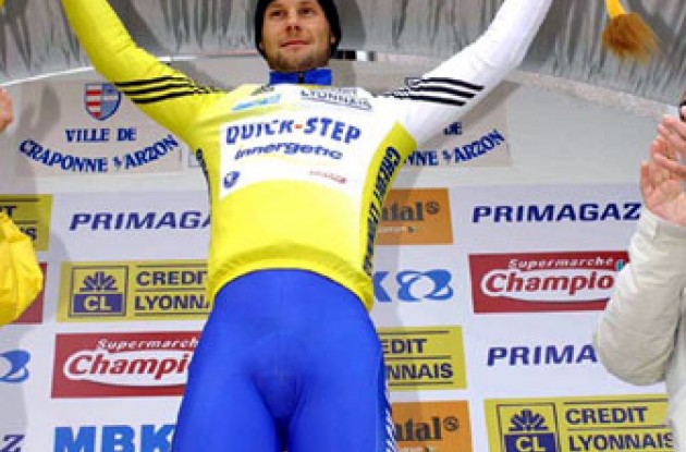 Boonen in the yellow and white leader's jersey. Photo copyright Fotoreporter Sirotti.