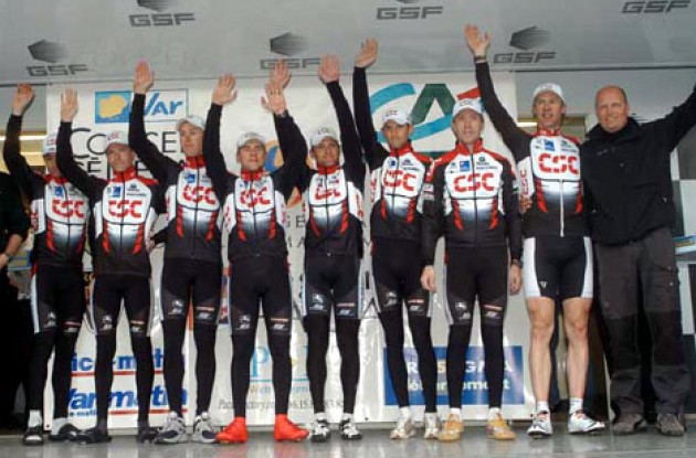 Team CSC on the podium. Notice the proud team boss to the right. Photo copyright Fotoreporter Sirotti.