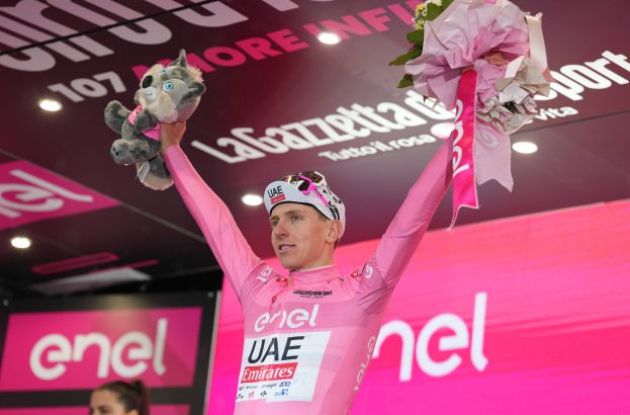 Tadej Pogacar on the podium in the pink jersey as leader of Giro d'Italia 2024