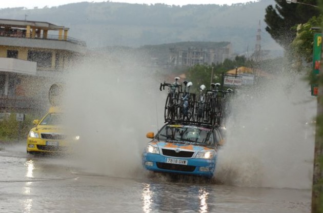 Team Garmin car transitioning from wet to even wetter conditions in today's stage of the Giro d'Italia. Lots of water indeed. Watch riders swim through today's stage in our video section at www.roadcycling.com/video . Photo copyright Fotoreporter Sirotti.