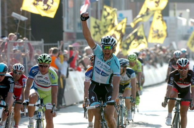 Tom Boonen of Team Omega Pharma-QuickStep powers to victory in Gent-Wevelgem 2012 ahead of Peter Sagan of Team Liquigas-Cannondale and Matti Breschel from Team Rabobank. Photo Fotoreporter Sirotti.