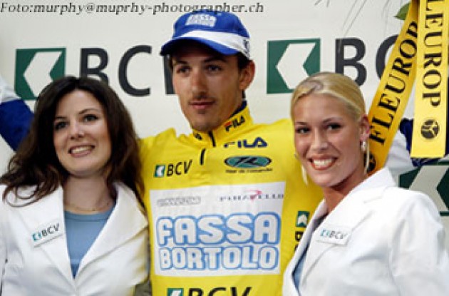 Cancellara on the podium. (Wow - do they have white teeth!) Photo copyright IMG (SUISSE) SA. 