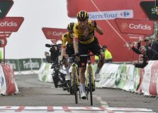 Primoz Roglic crosses the finish line as winner of stage 17 at Vuelta a Espana 2023