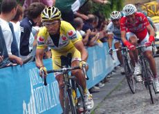 Simni leads Garzelli up the climb. Simni leads Garzelli up the climb.