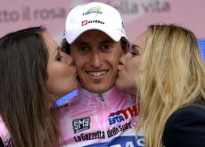 Not many podium girl kisses for Pellizotti now. Photo copyright Fotoreporter Sirotti.