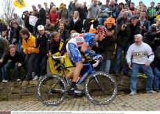 Team BMC Racing's George Hincapie on his BMC SLR01 Team machine. Photo copyright Tim de Waele.
