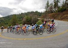 Riders climb.